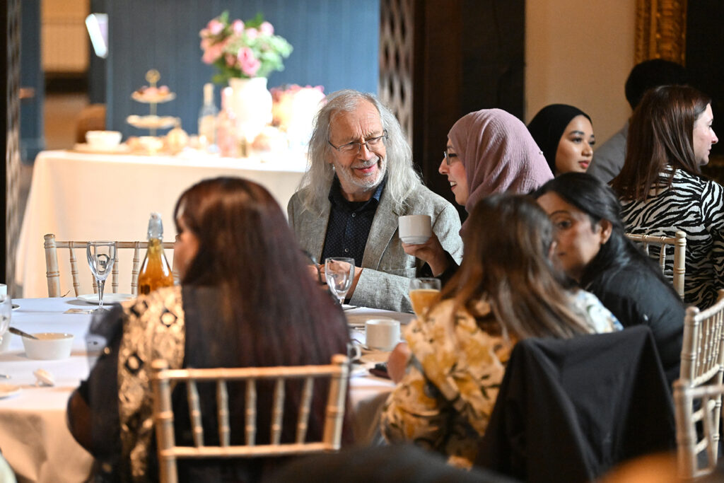 Guests enjoying One Voice Blackburn Afternoon Tea at Samlesbury Hall 2025