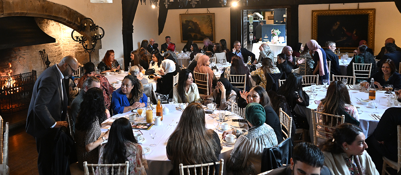 Guests enjoying One Voice Blackburn Afternoon Tea at Samlesbury Hall 2025